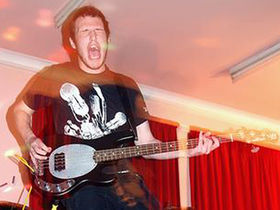 Bassist headbangs himself blind